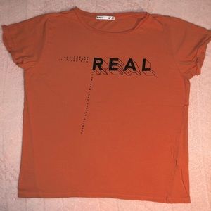 Orange shirt, size medium